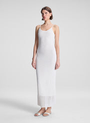 woman wearing white maxi dress