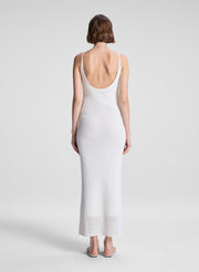 woman wearing white maxi dress