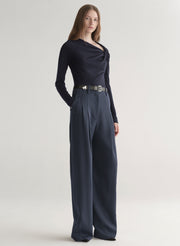 woman wearing navy blue top and navy blue pants