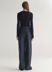 woman wearing navy blue top and navy blue pants