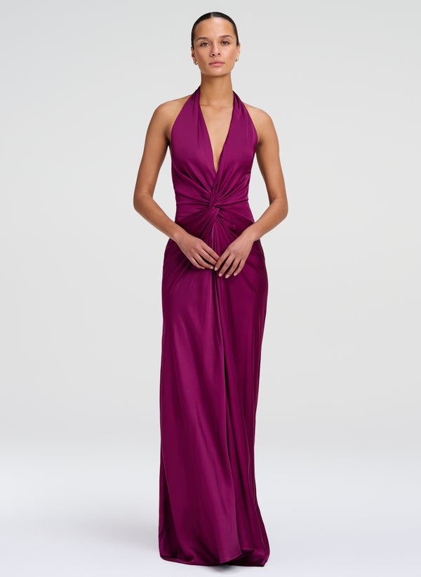 woman wearing jewel toned satin gown