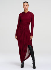 woman wearing burgundy wrapped dress