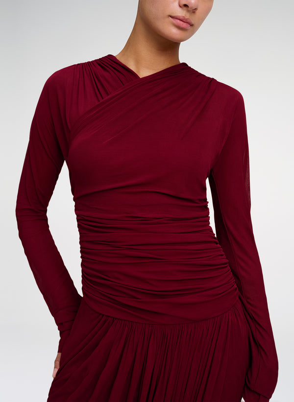 close up of burgundy long sleeve dress