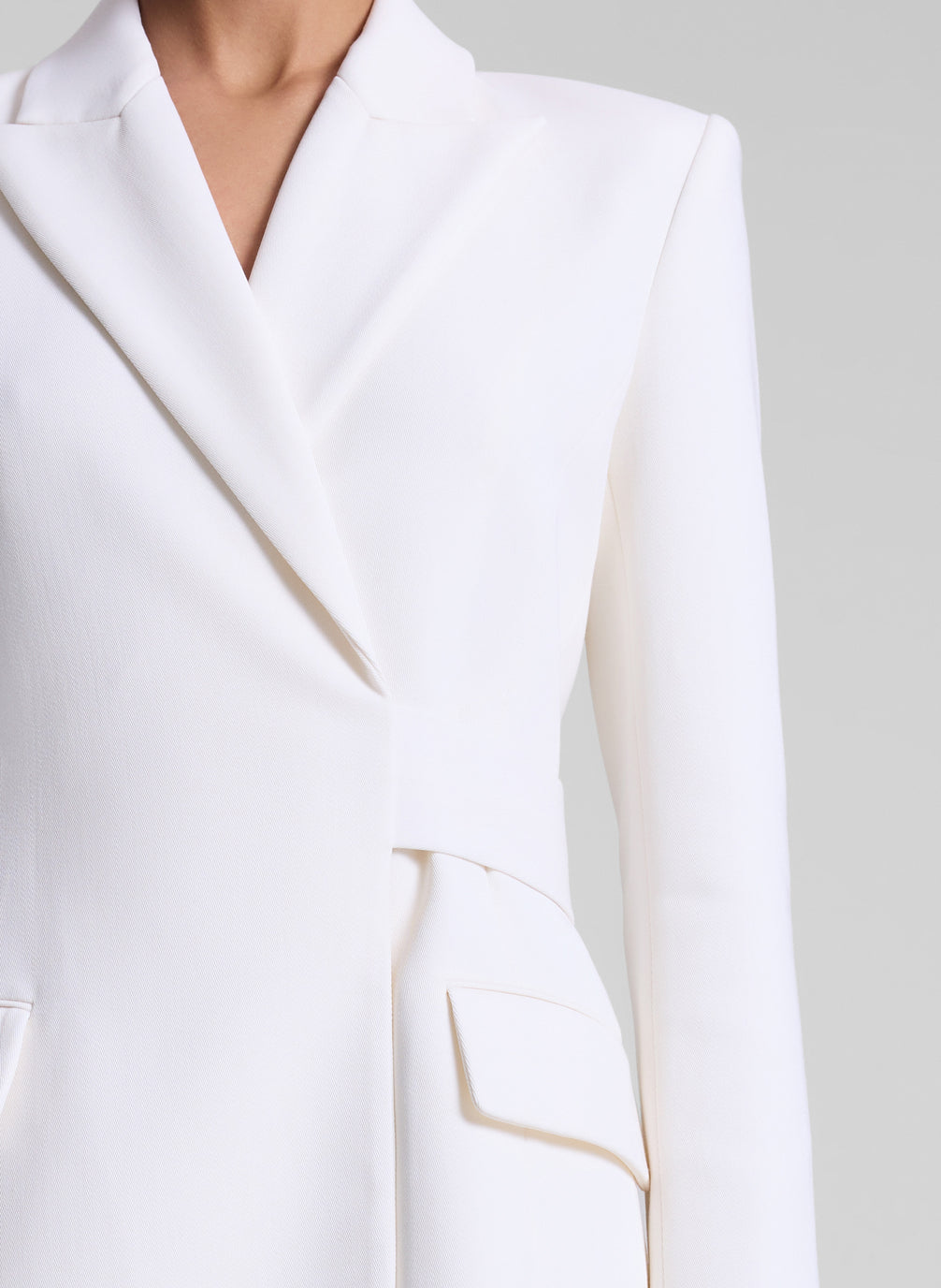 woman wearing white blazer dress