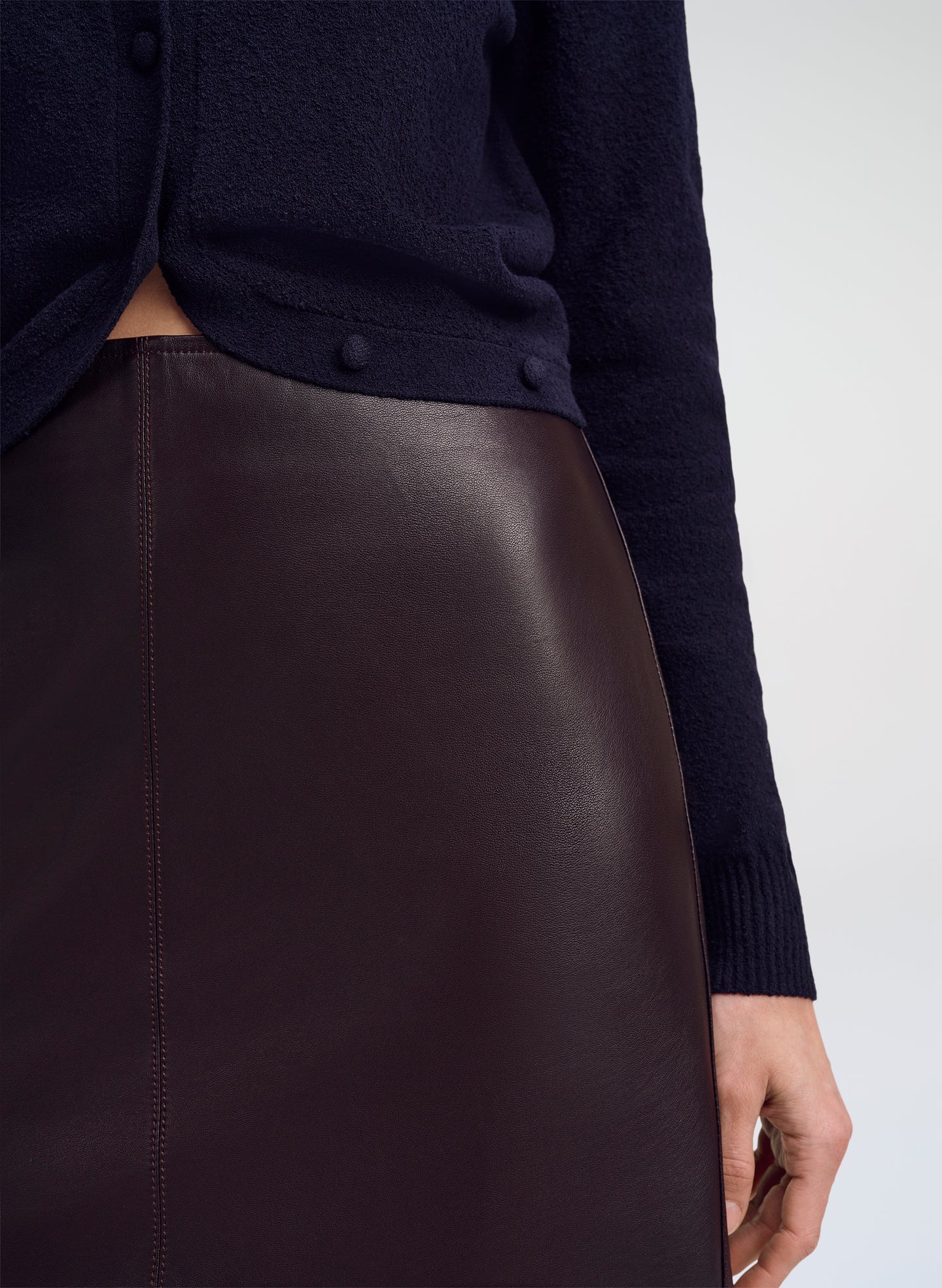 close up of brown leather midi skirt