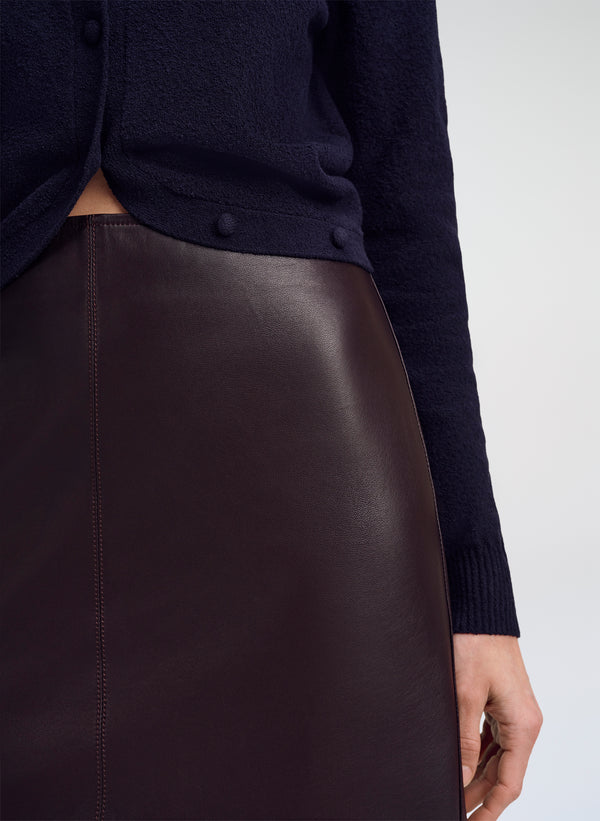close up of brown leather midi skirt