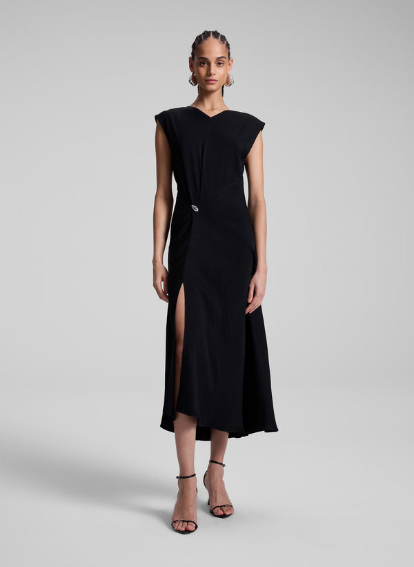 woman wearing black midi dress