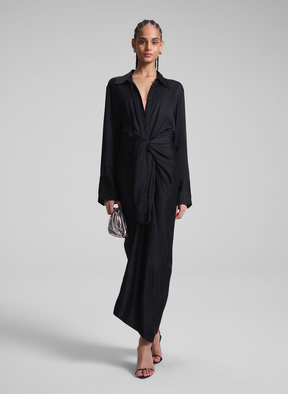 woman wearing black maxi shirt dress