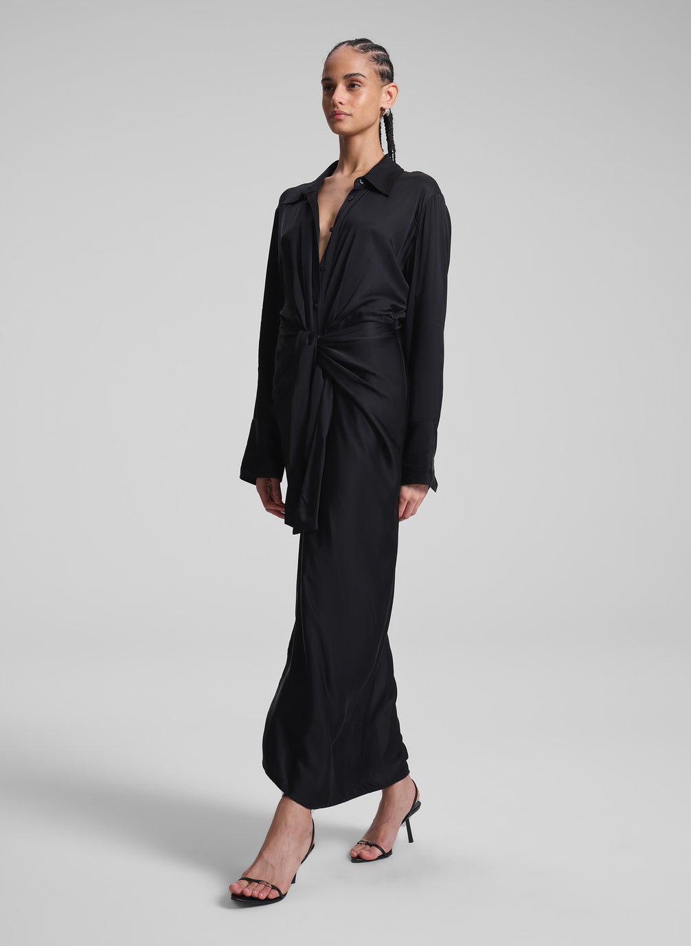 woman wearing black maxi shirt dress