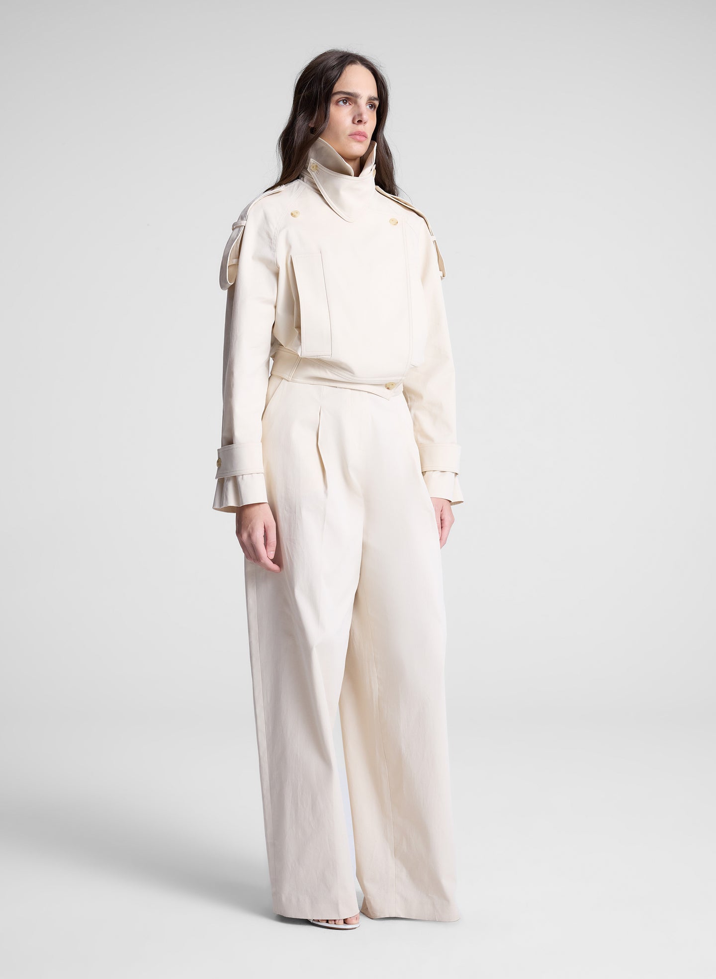 woman wearing beige pant and jacket set