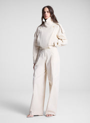 woman wearing beige pant and jacket set