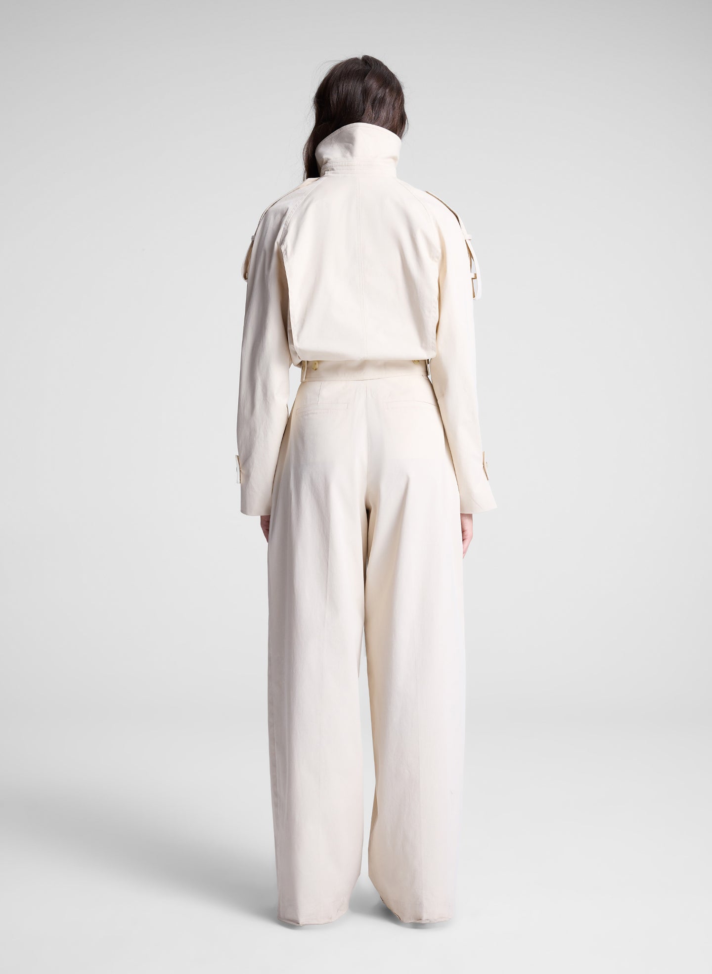 woman wearing beige pant and jacket set