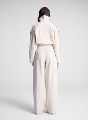 woman wearing beige pant and jacket set