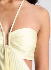 woman wearing light yellow maxi dress