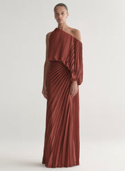 woman wearing maroon satin pleated one shoulder top and matching maxi skirt