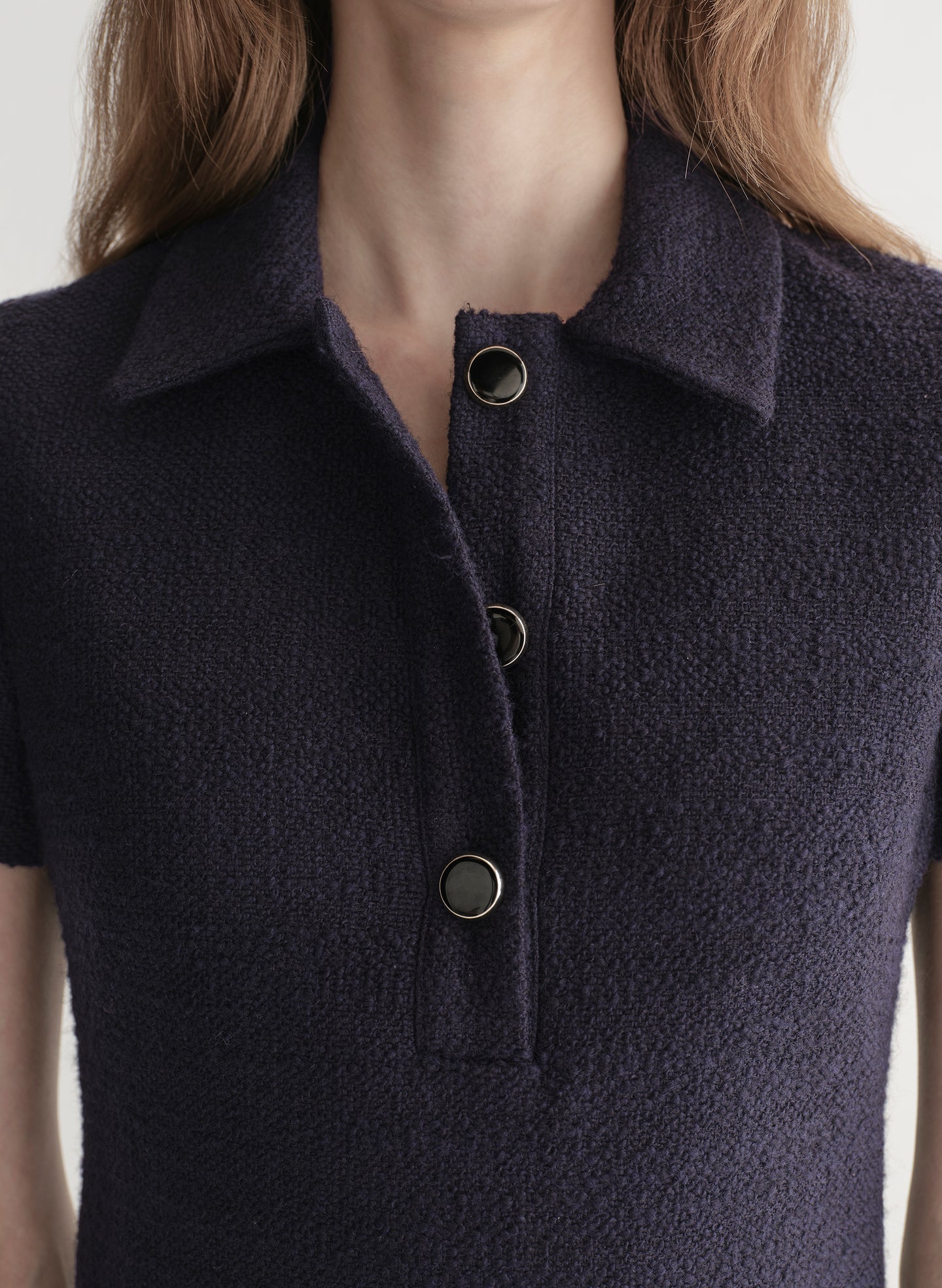 woman wearing dark navy blue mini dress