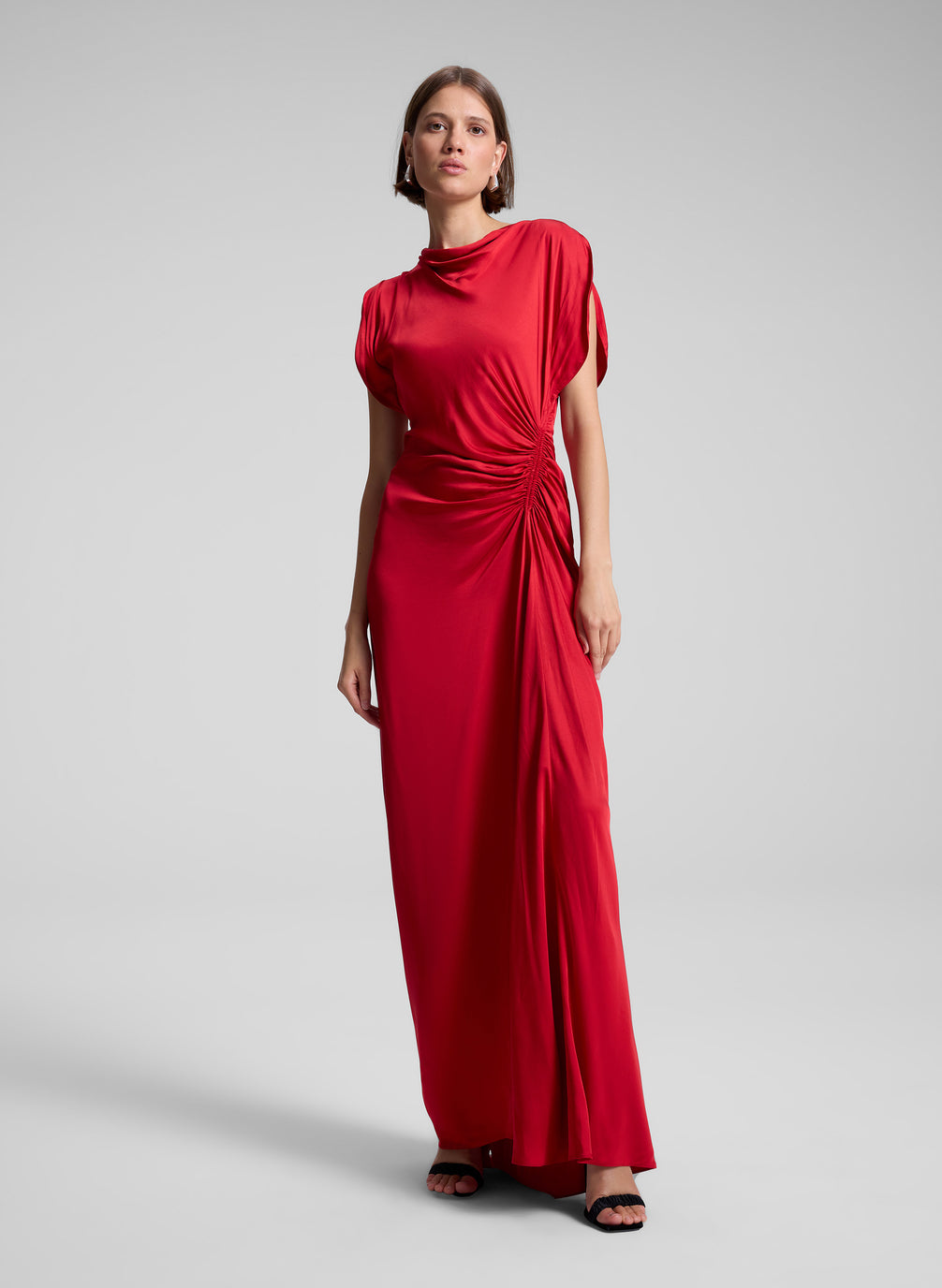 woman wearing red satin gown