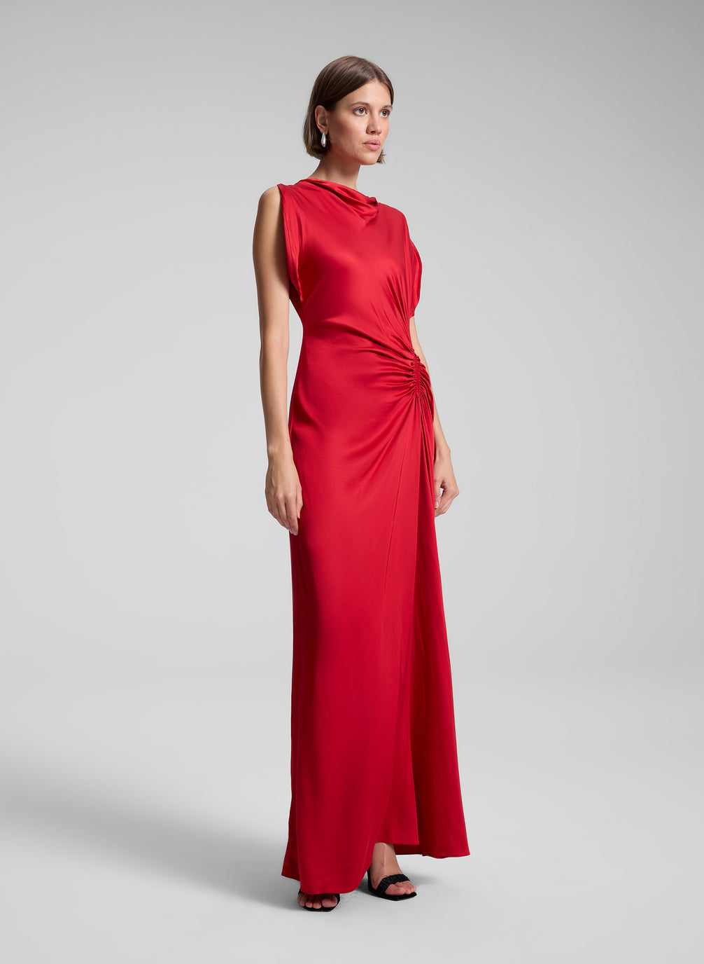 woman wearing red satin gown