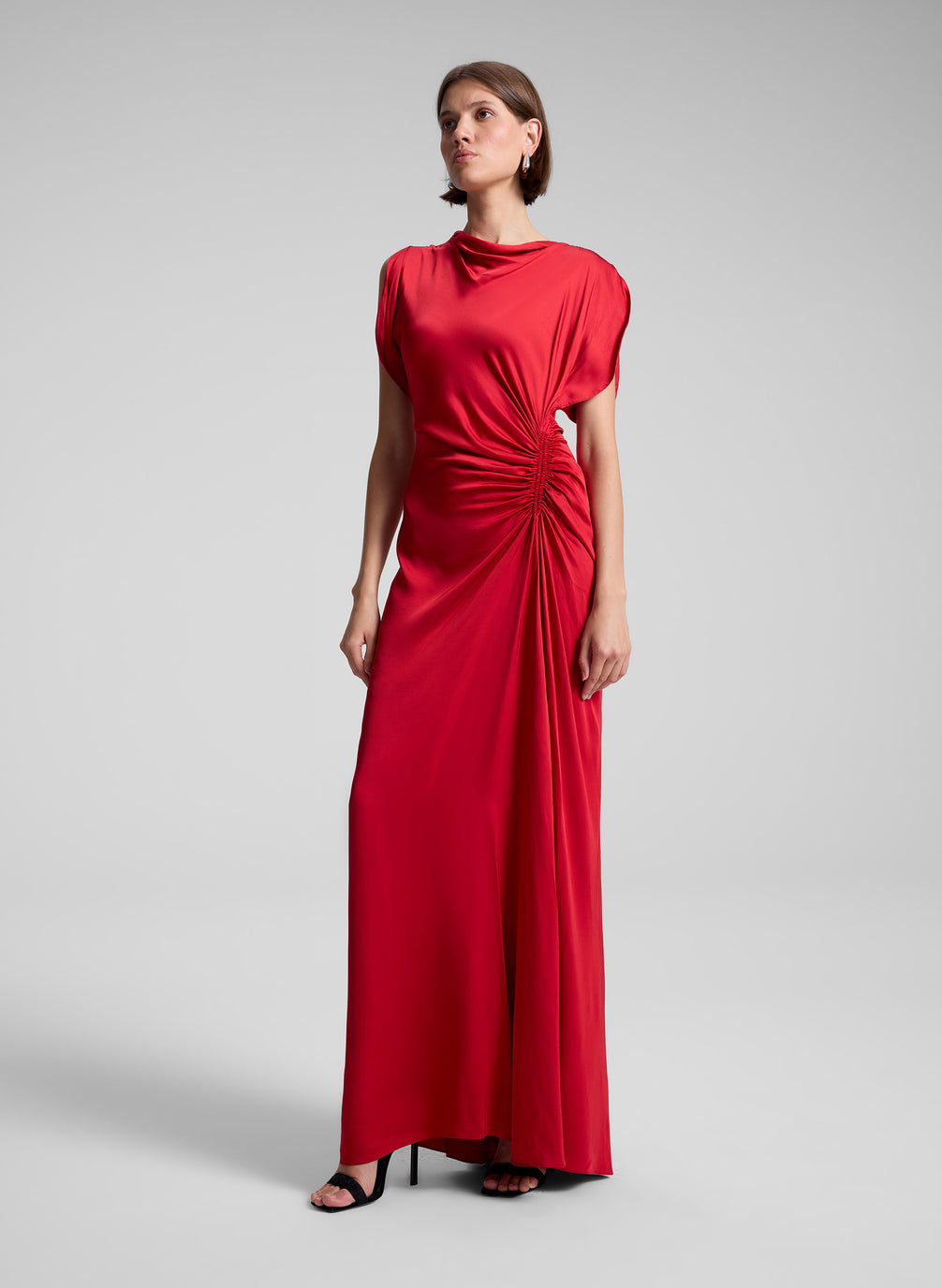 woman wearing red satin gown