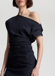 woman wearing black off shoulder midi dress