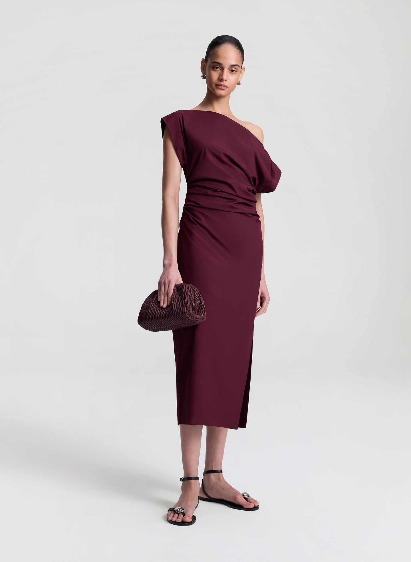 woman wearing purple off shoulder midi dress
