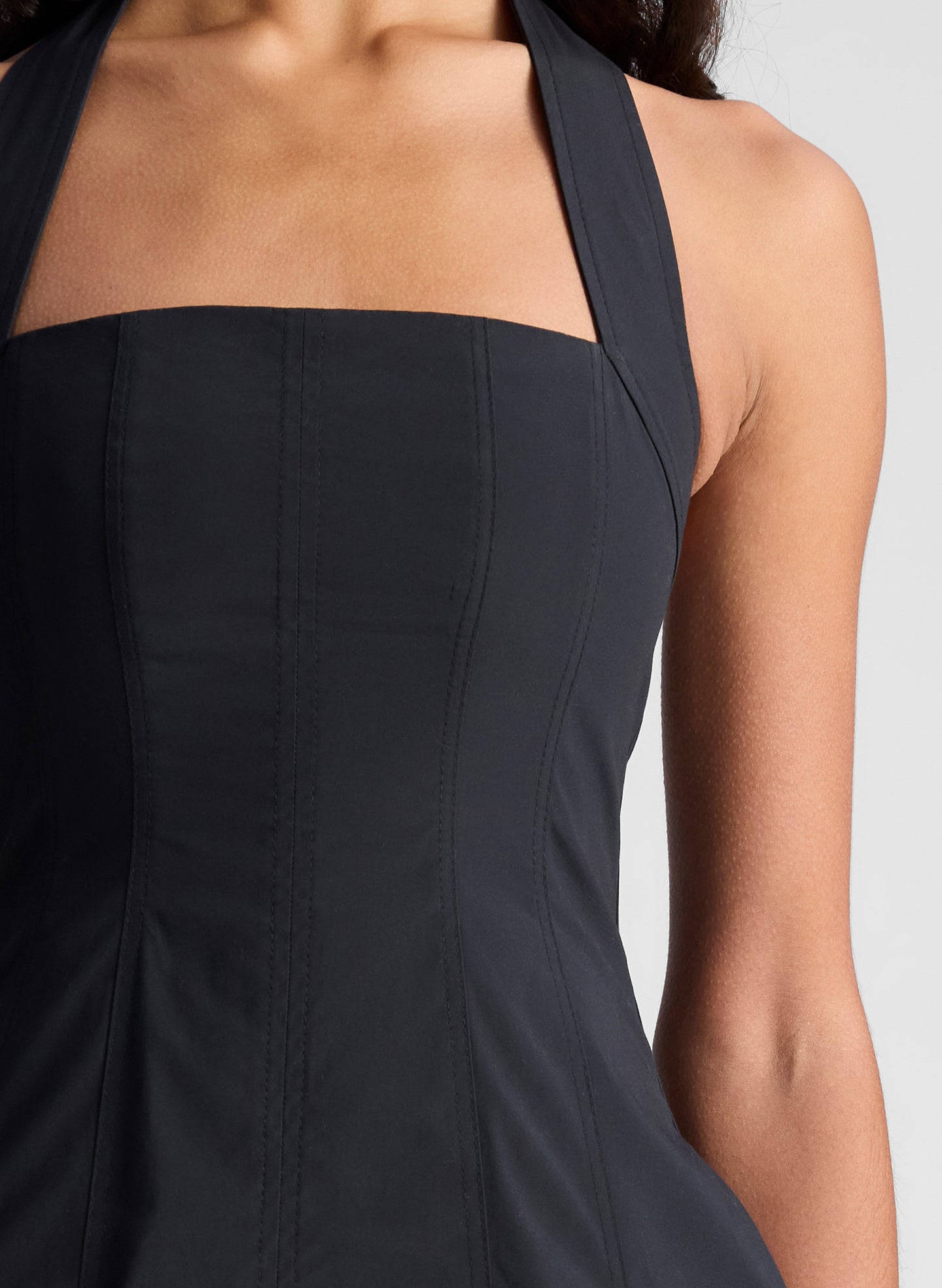 woman wearing black minidress