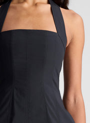 woman wearing black minidress