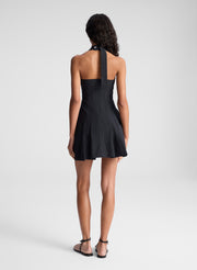 woman wearing black minidress