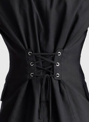 woman wearing black vest and black capri pants