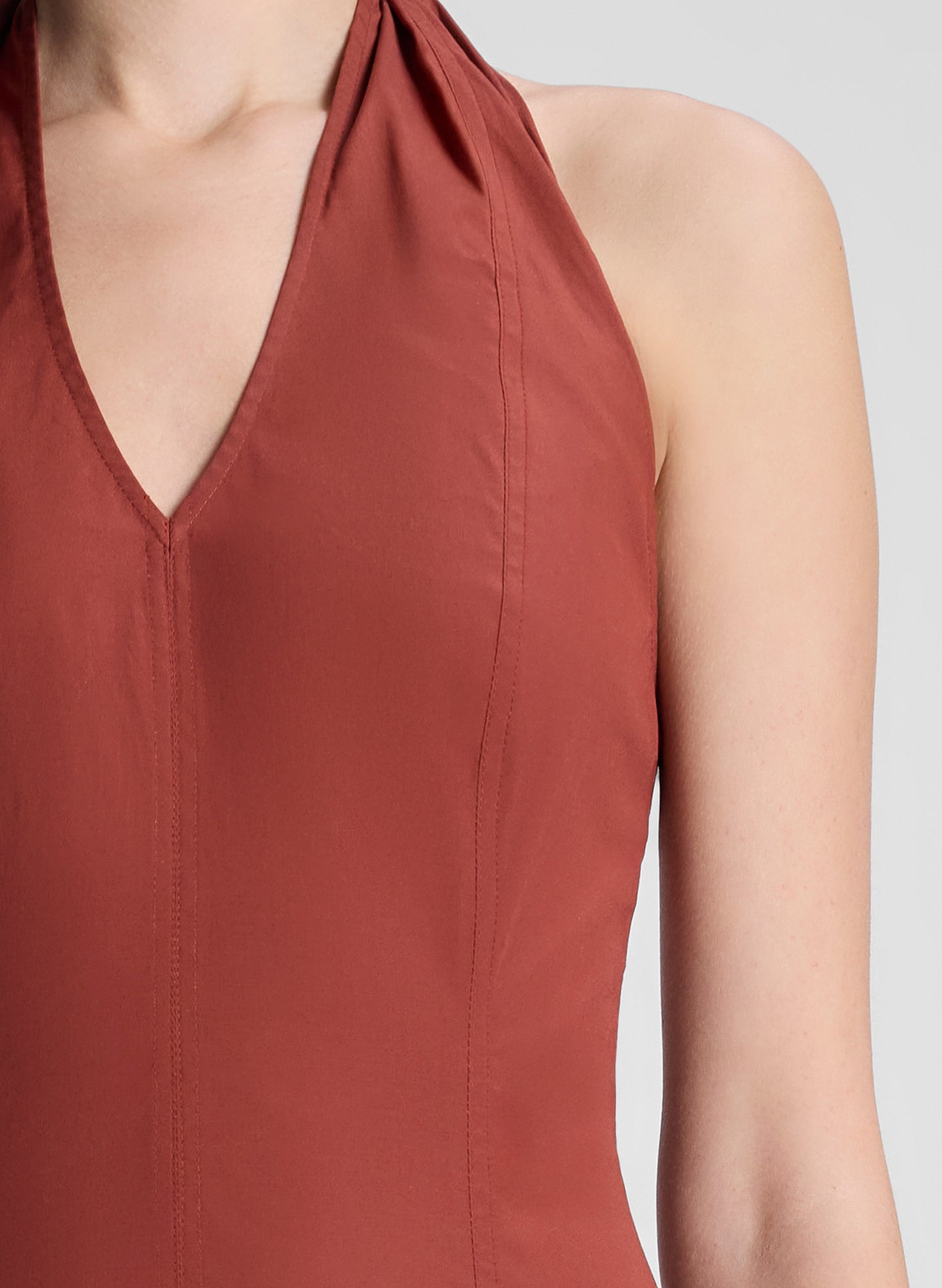 woman wearing maroon drop waist midi dress