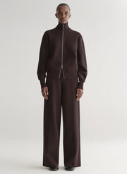 woman wearing brown zip cardigan and matching pants