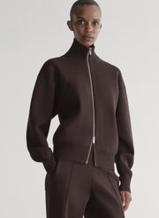 woman wearing brown zip cardigan and matching pants