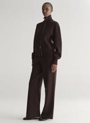 woman wearing brown zip cardigan and matching pants