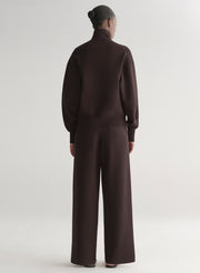 woman wearing brown zip cardigan and matching pants