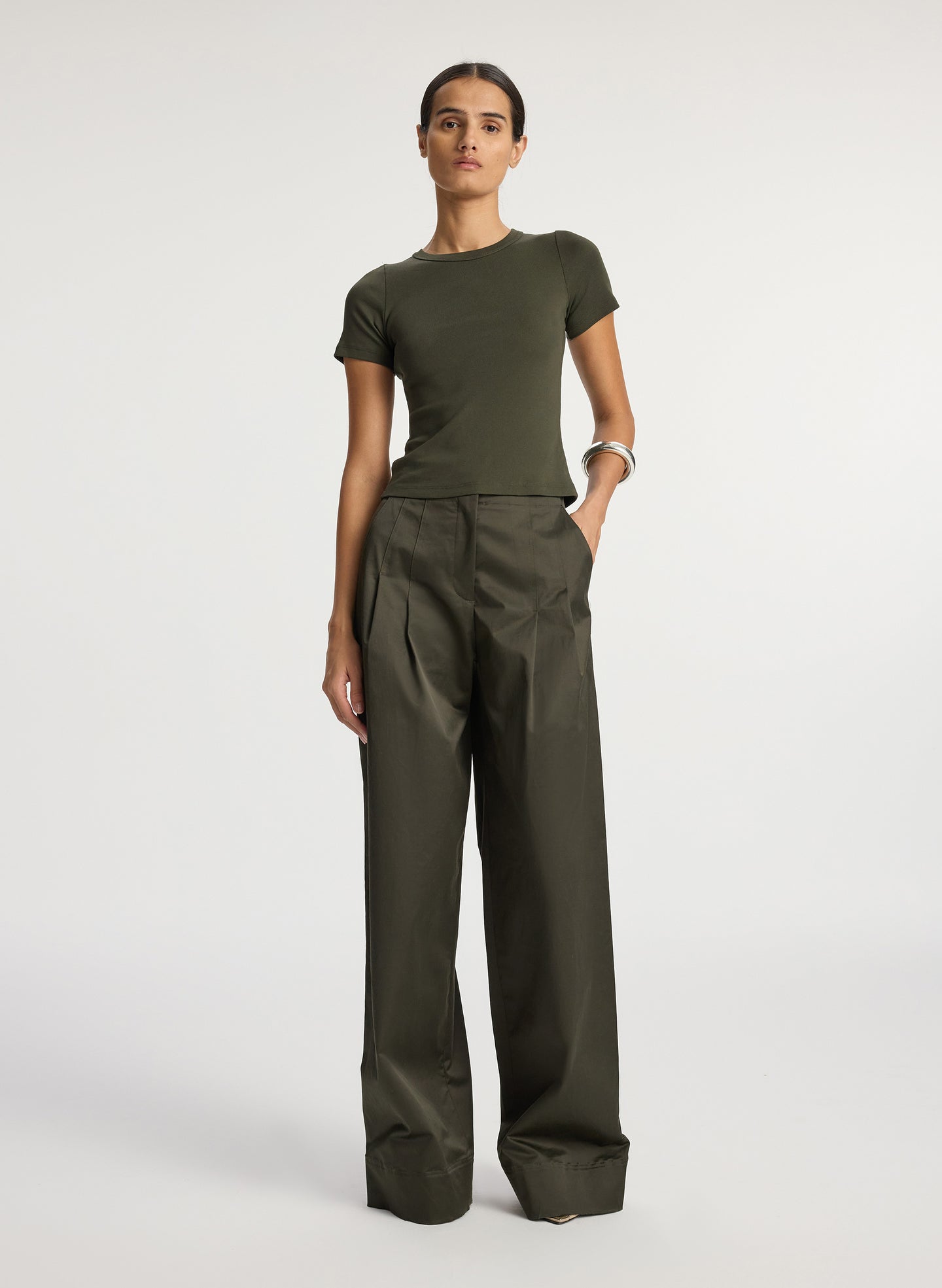 front view of woman wearing olive green tshirt and olive green wide leg pants
