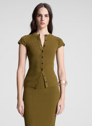 woman wearing brown short sleeve cardigan and matching skirt