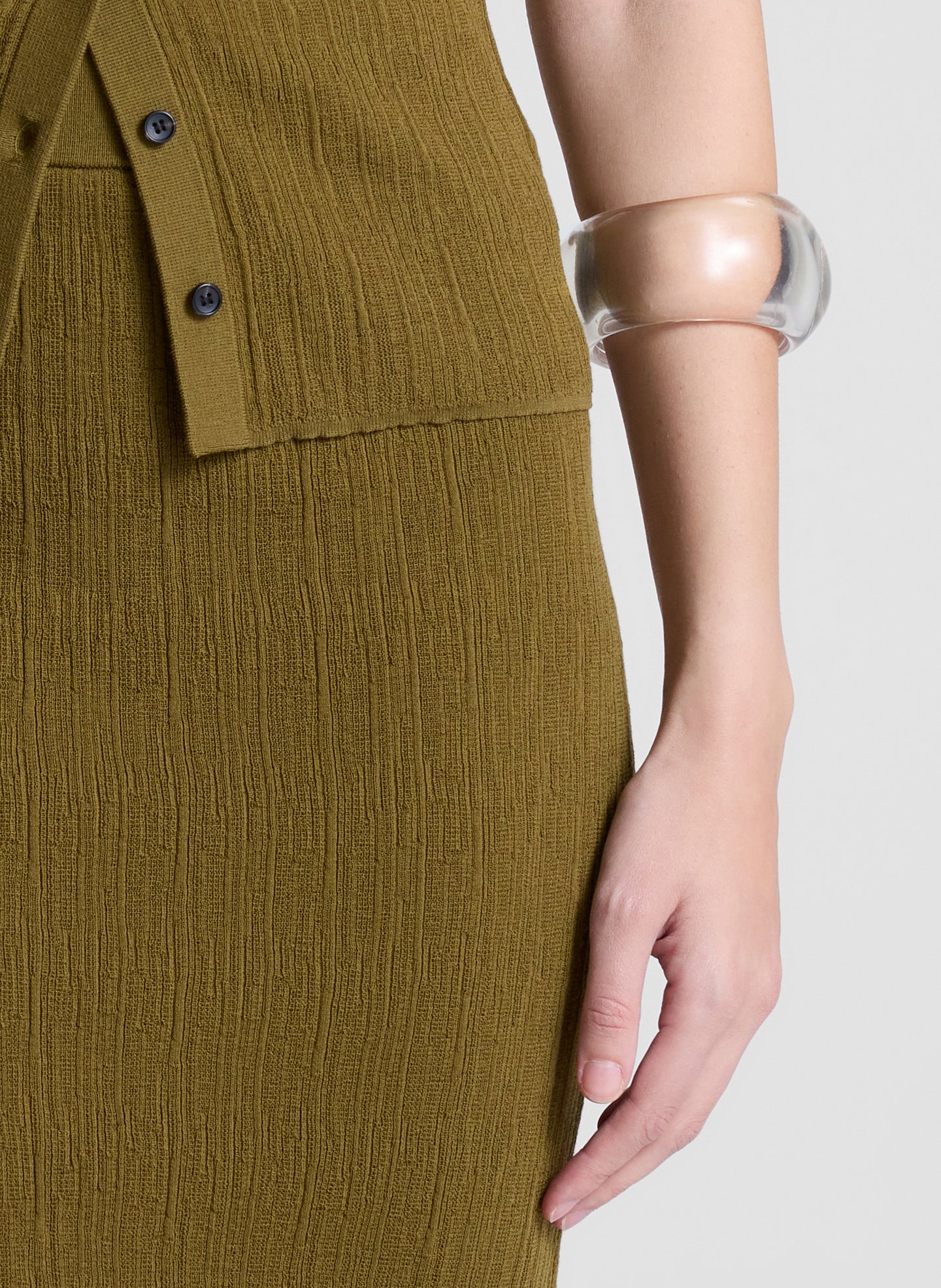 woman wearing brown short sleeve knit top and matching knit midi skirt