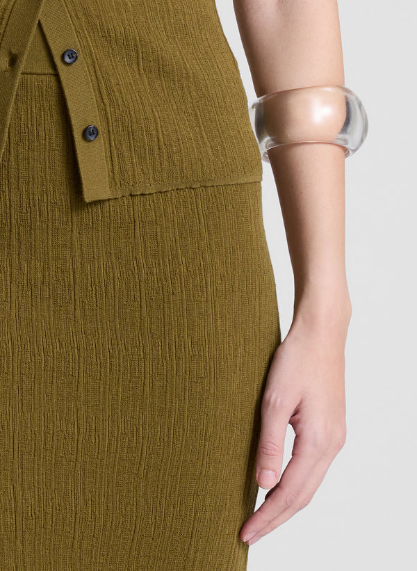 woman wearing brown short sleeve knit top and matching knit midi skirt