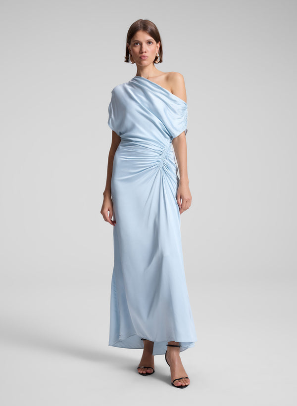 woman wearing light blue maxi dress