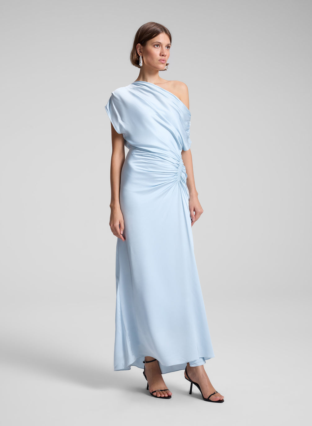 woman wearing light blue maxi dress