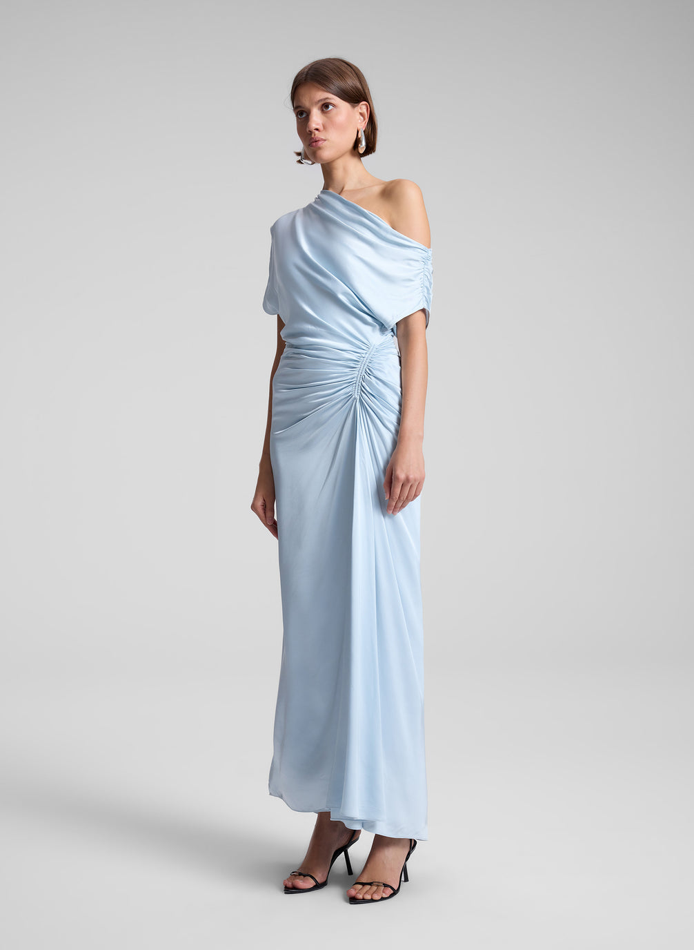 woman wearing light blue maxi dress