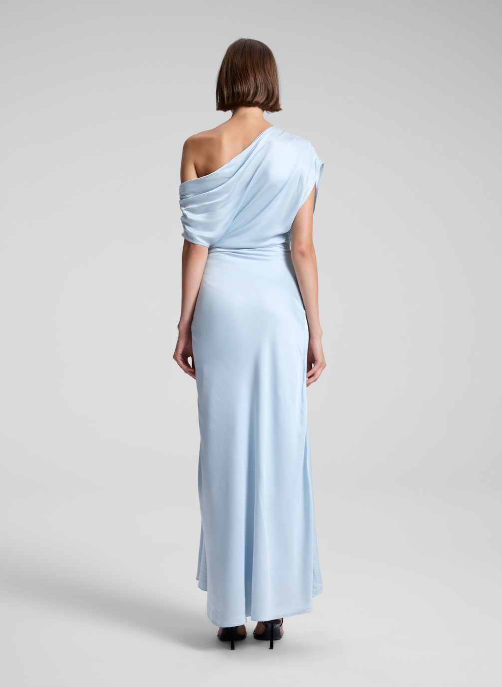 woman wearing light blue maxi dress