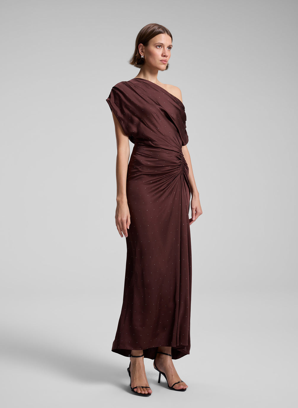 woman wearing brown satin embellished dress