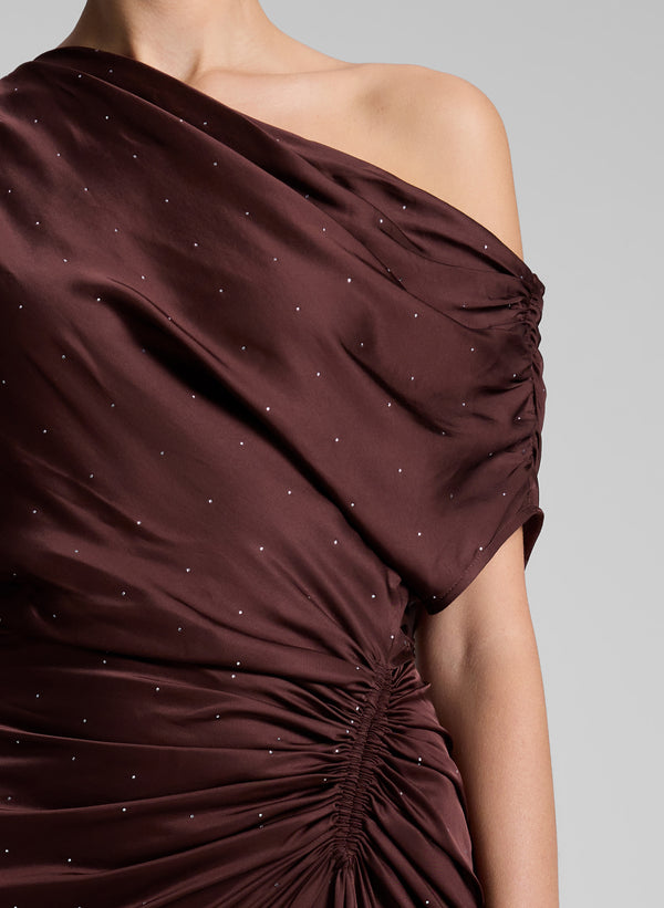 woman wearing brown satin embellished dress