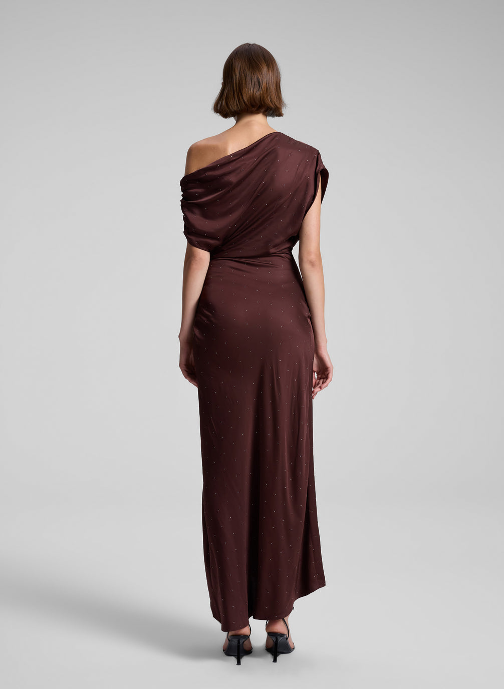 woman wearing brown satin embellished dress