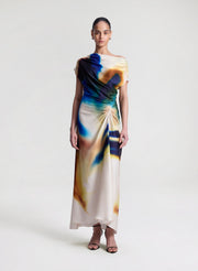 woman wearing multicolor satin maxi dress