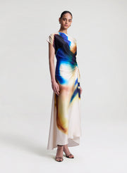 woman wearing multicolor satin maxi dress