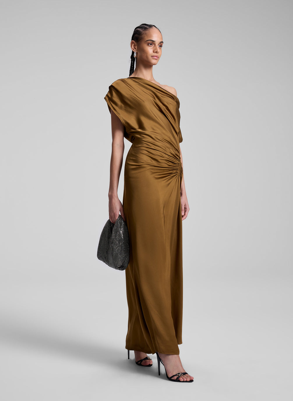 woman wearing brown maxi dress