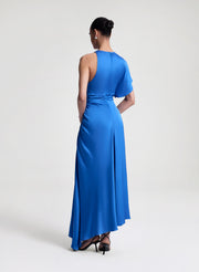woman wearing blue satin maxi dress