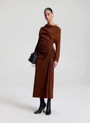 woman wearing brown dress